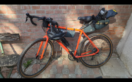 Bicicletta Gravel Genesis arancione